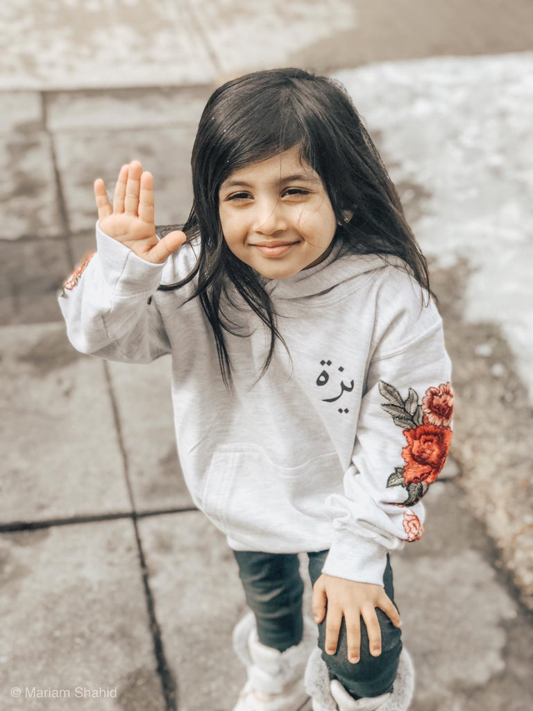 artbyzakia childrens personalised hoodie with red floral embroidery and arabic name