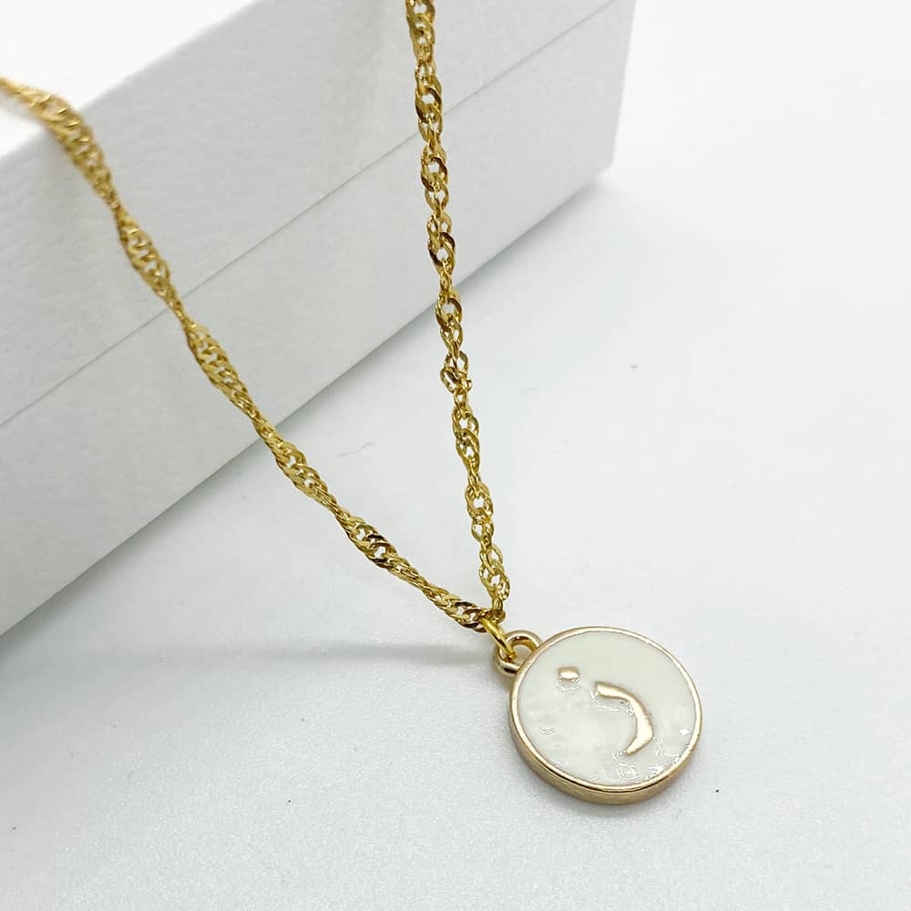 white enamel and 18ct gold plated initial pendant necklace with Z in arabic