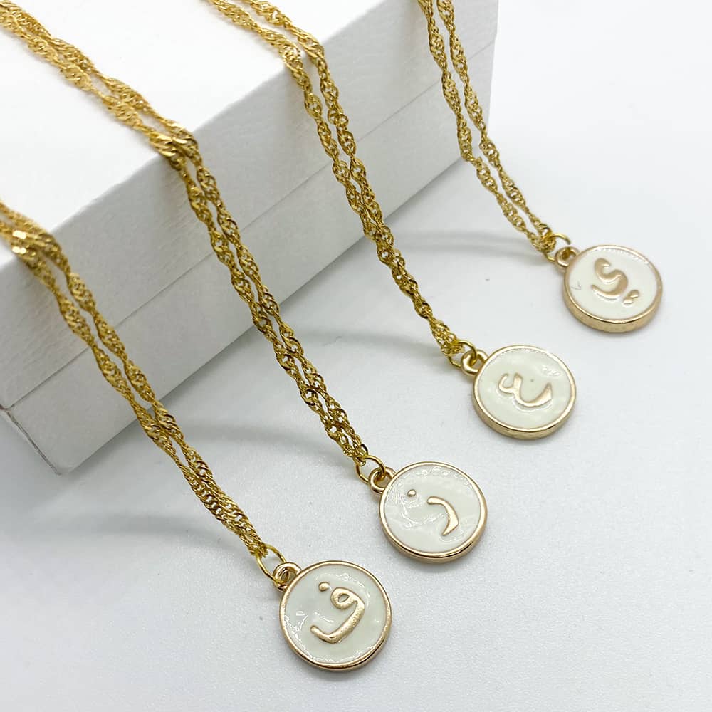 arabic initial personalised necklace with white enamel