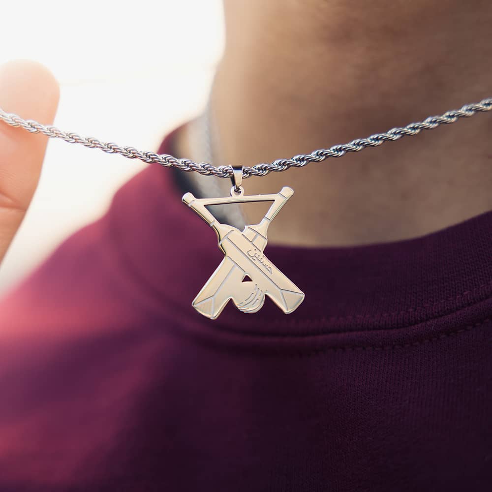 man wearing personalised necklace for men inspired by cricket for cricket fans with engraved name