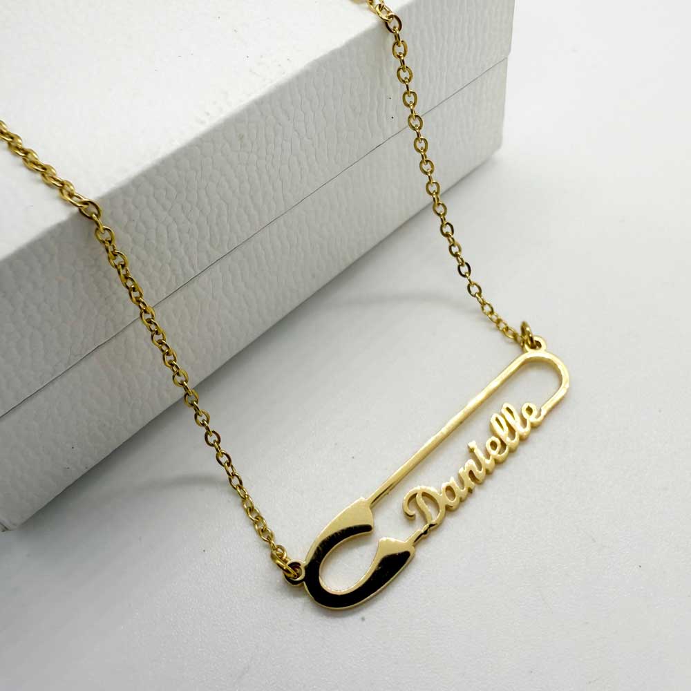 18ct gold plated safety pin design necklace with name danielle