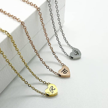 dainty heart necklace with initial engraved in arabic, english and punjabi in 18k gold plated