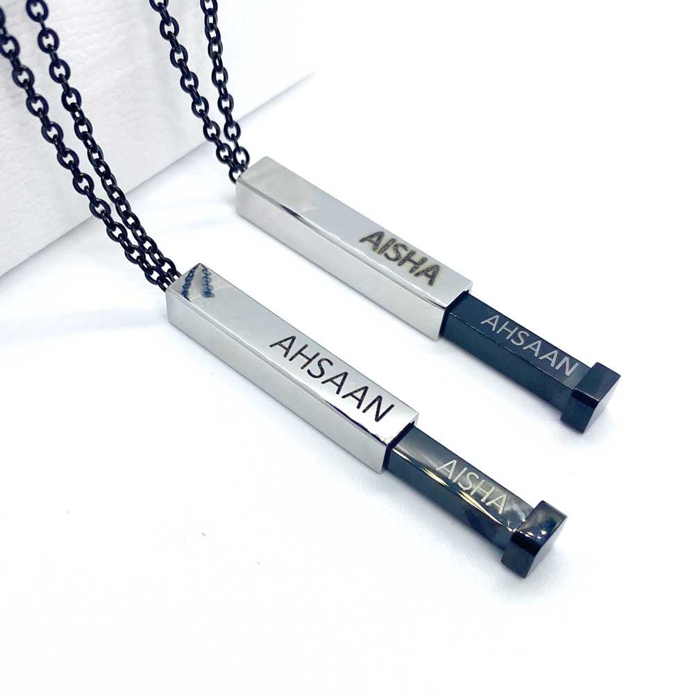 black hidden name necklace with couples name engraved on inside and outside for gifts for couples
