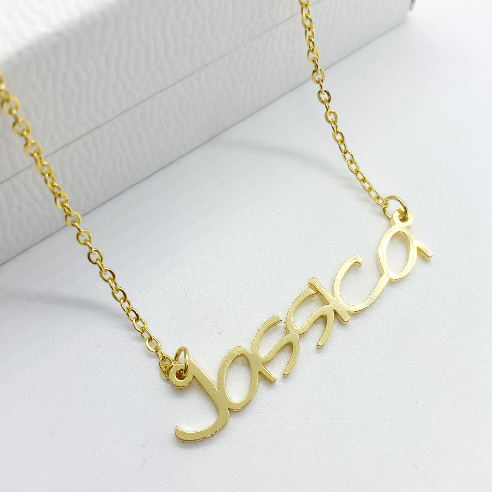 18ct gold plated name necklace in English with the name Jassica in handwritten font