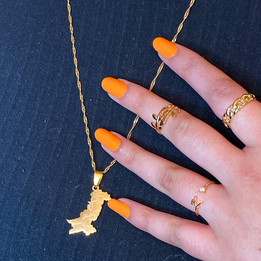 model wearing pakistan map necklace