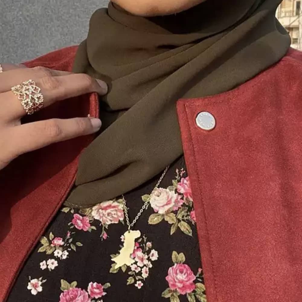 hijabi wearing pakistan map necklace