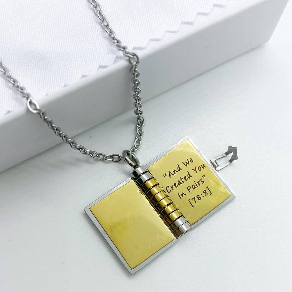 engraved hidden message quote in book necklace
