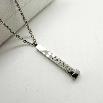 silver bar necklace with name zaynah engraved onto it