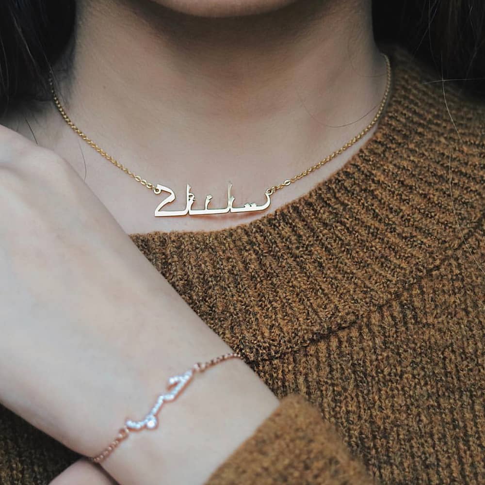 ladies personalised name necklace in Arabic paired with an arabic bracelet