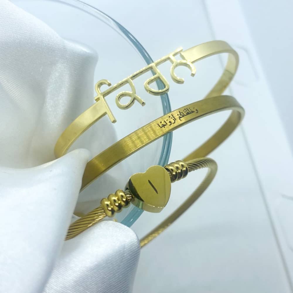 artbyzakia engraved and custom made bangles with punjabi and arabic name