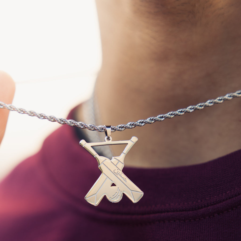 man wearing personalised necklace for men inspired by cricket for cricket fans with engraved name