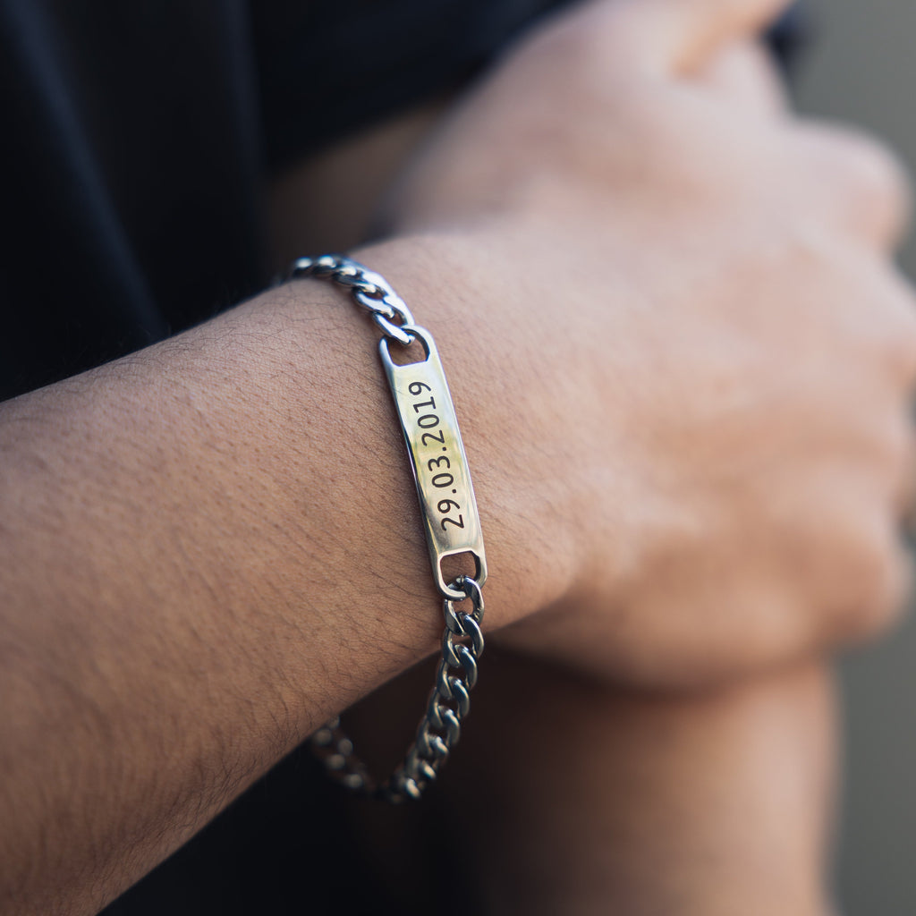 Elevate your style with our Engraved Bar Bracelet for Men - A personalized accessory that exudes confidence. Crafted with precision, this bracelet features a sleek bar pendant that can be engraved with your chosen text, name, or message. Perfect for adding a touch of sophistication to any outfit. Make a statement that reflects your individuality. 