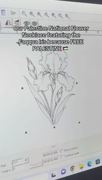 engraving process of a pendant being engraved with a faqqua iris line art drawing for Palestine