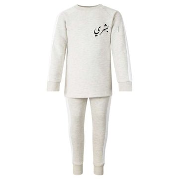 sand tracksuit set for kids with white side panel and black personalised name in urdu