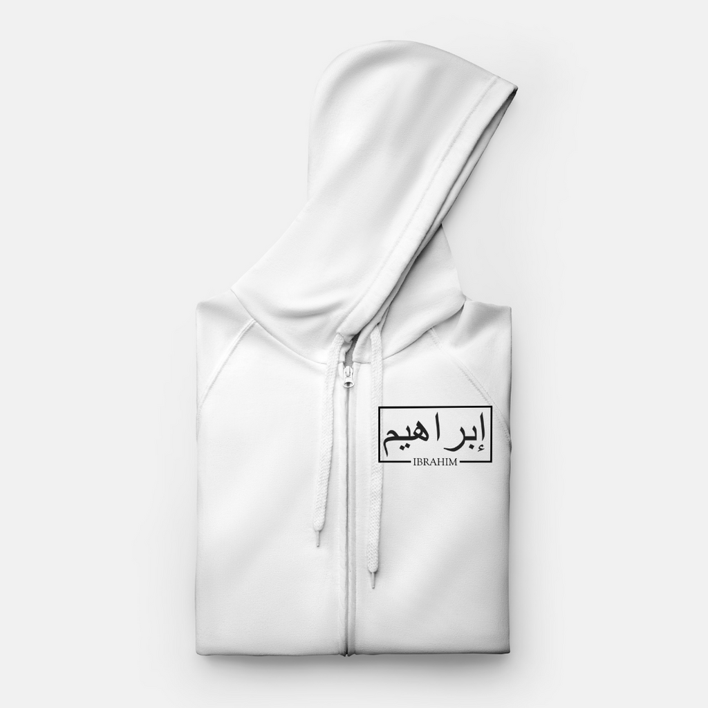 White zipped hoodie with black Arabic and English name on left chest
