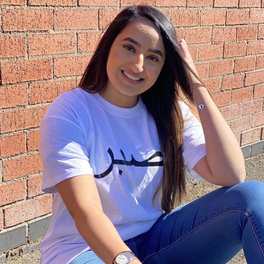 White T-shirt’s with black custom arabic text