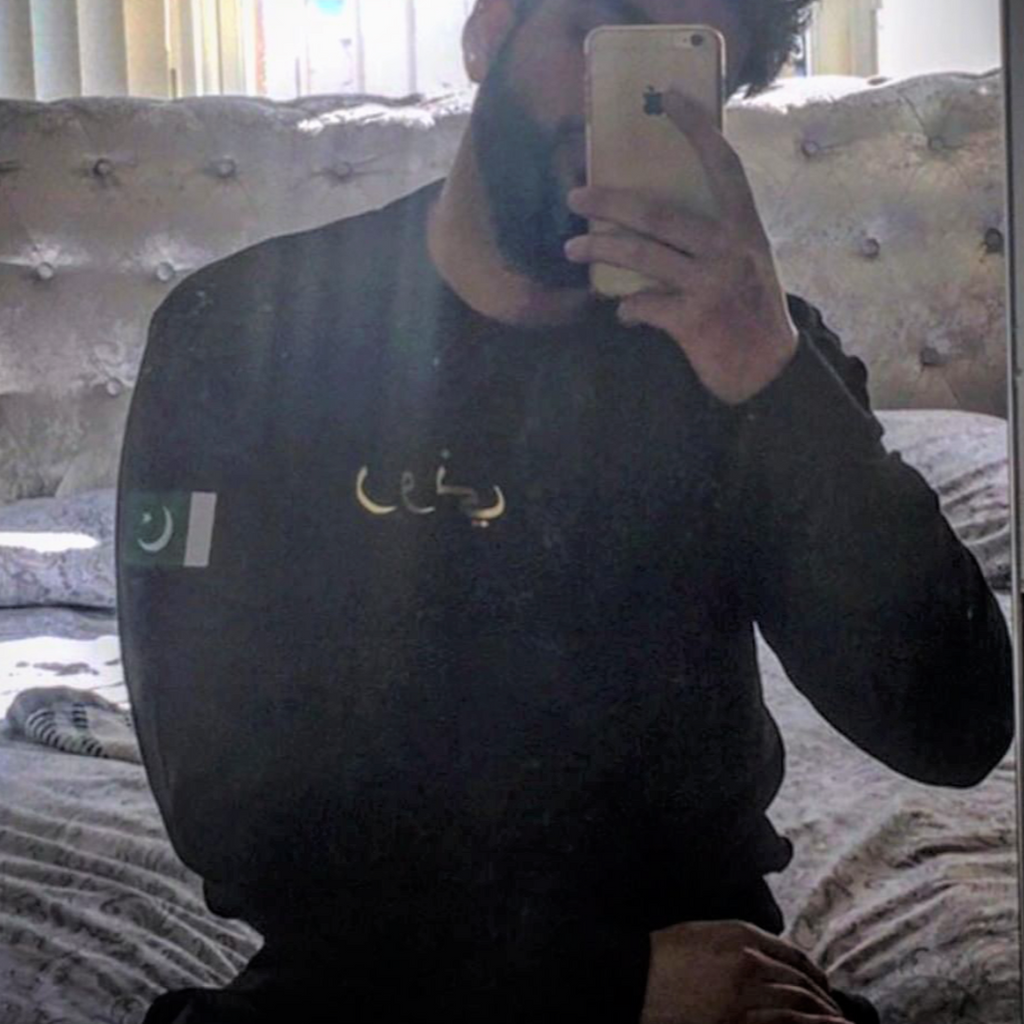 customer photo of black sweatshirt with embroidered Pakistan flag on sleeve
