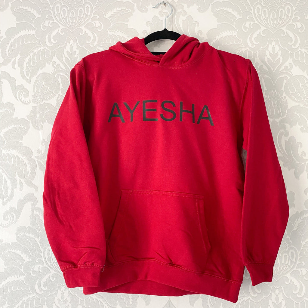 red hoodie with black English name printed across the front chest