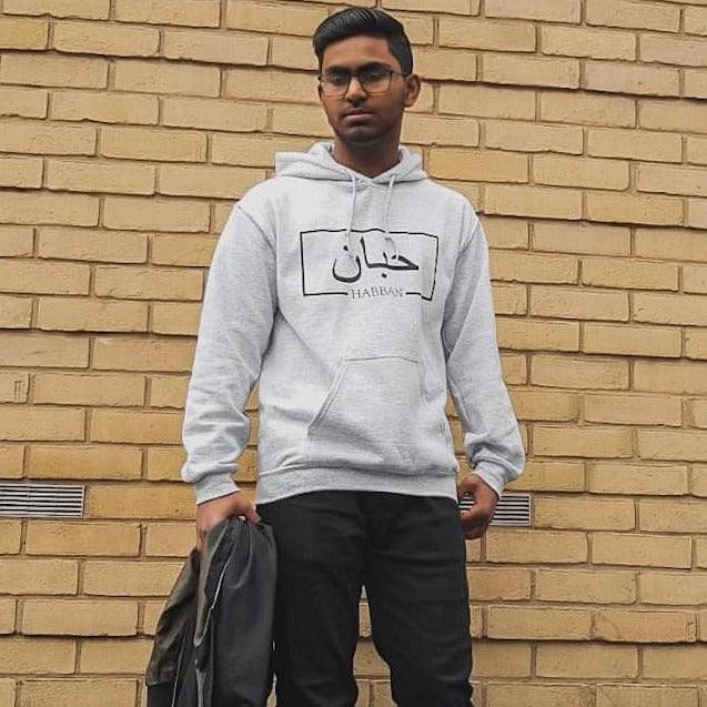 Ash Grey hoodie with black box design including Arabic and English name printed across the chest